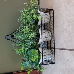 Faux plants in basket